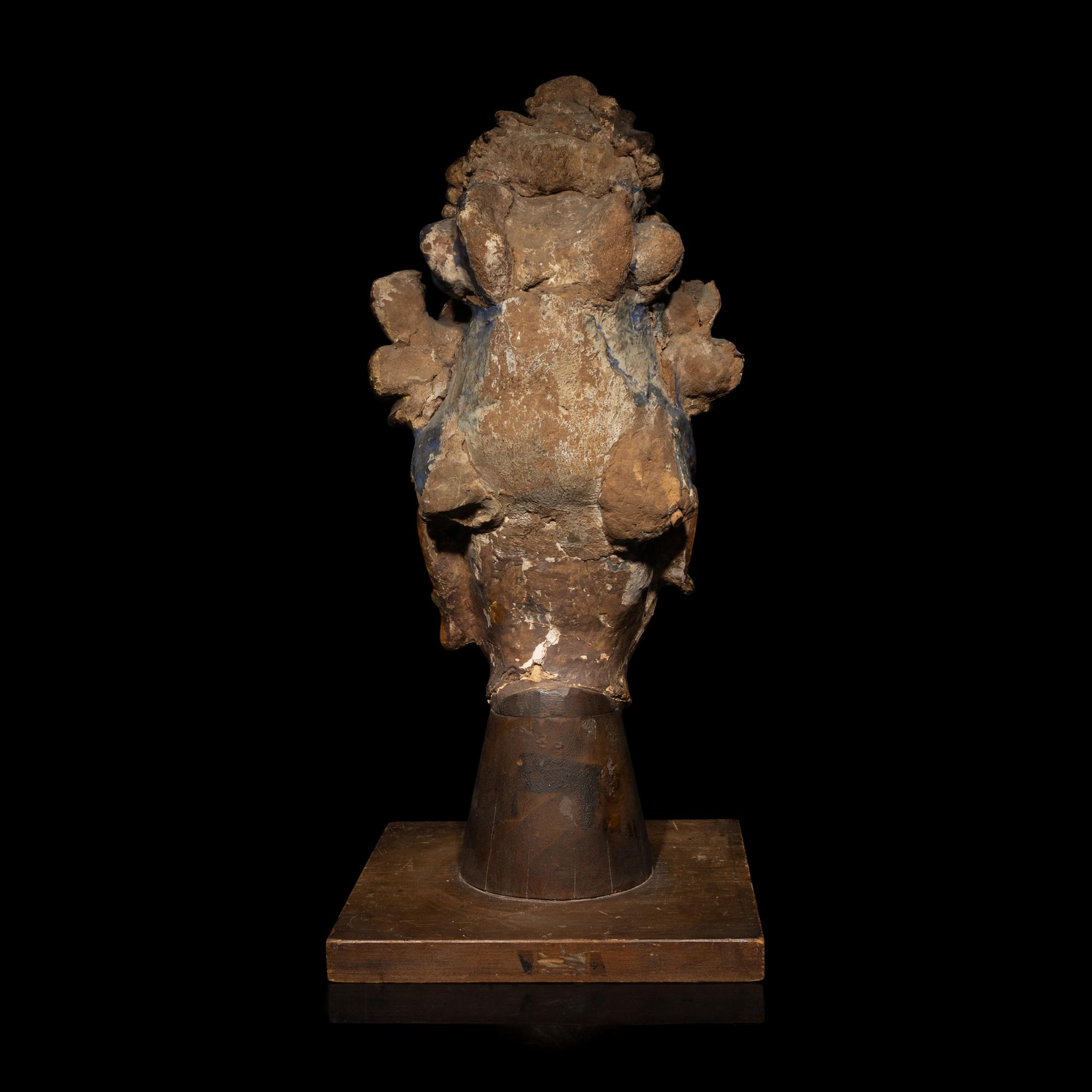 A Chinese Polychrome Painted Stucco Head of a Female Attendant, Song-Ming Dynasty 宋-明 彩繪泥塑侍女頭像