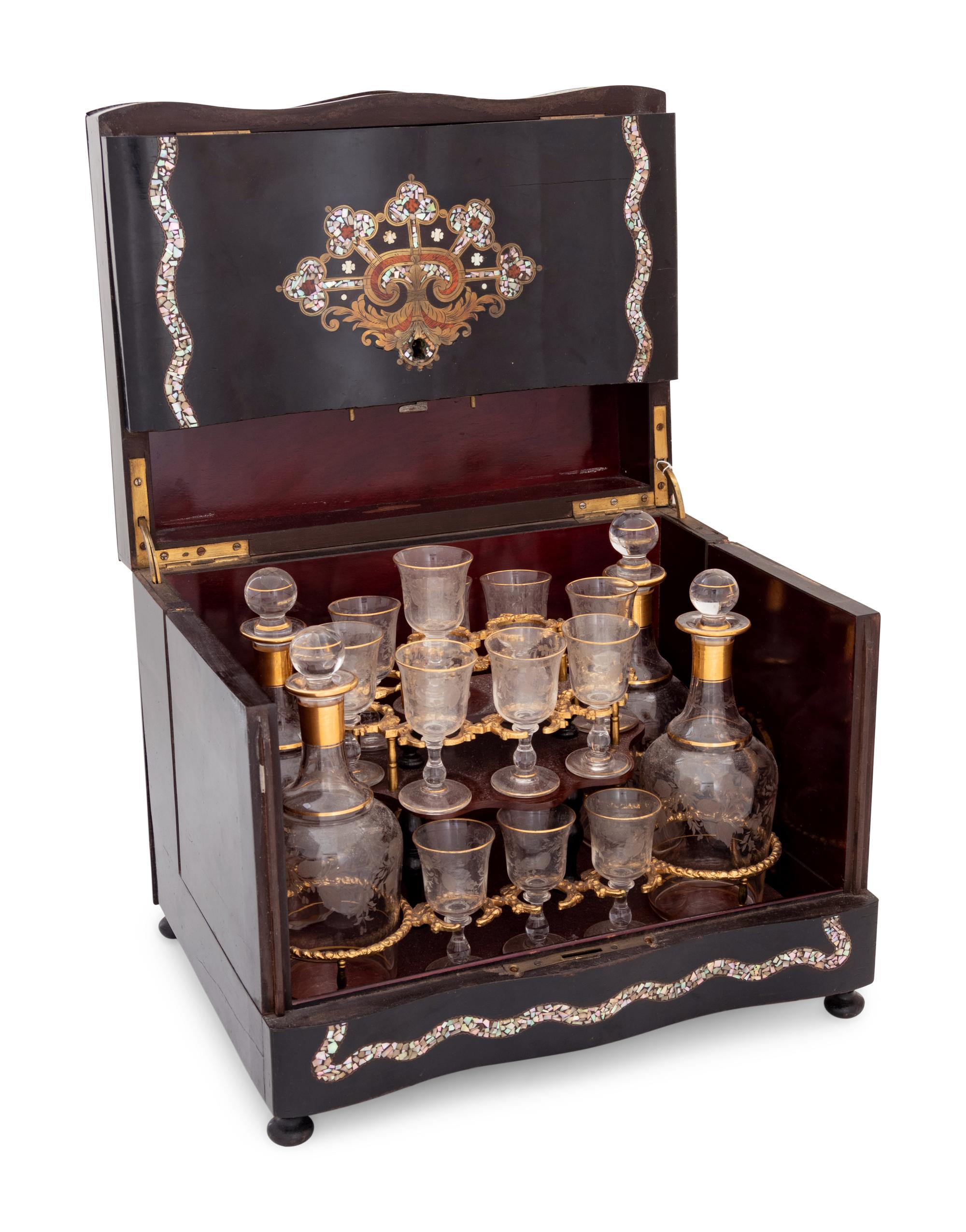 A Napoleon III Brass and Mother-of-Pearl Inlaid Ebonized Cave à Liqueur