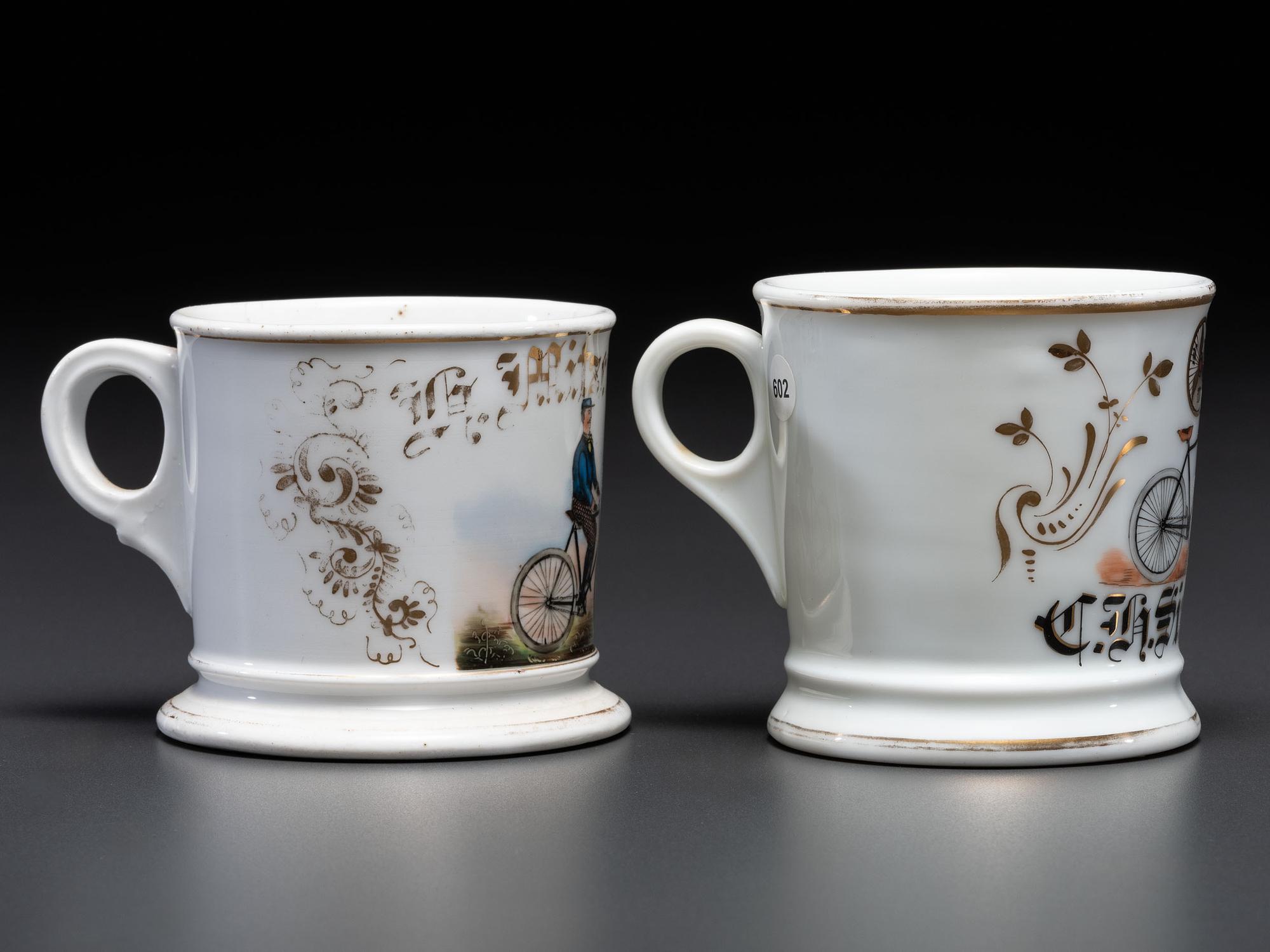 Two Cyclist's Porcelain Shaving Mugs