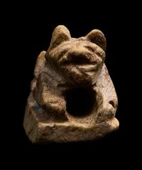 An Egyptian Faience Recumbent Animal