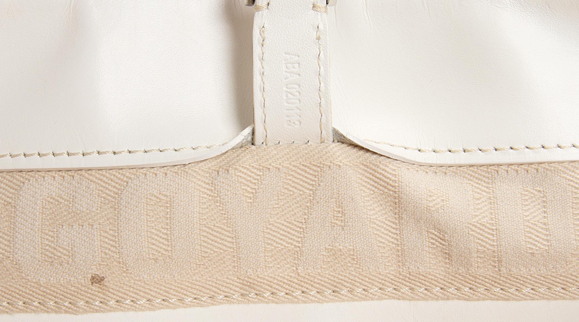 Six Goyard Items: Two Totes, Three Pouches, and One Wallet