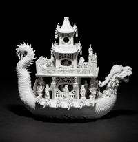 A White Biscuit Porcelain Model of a Dragon Boat