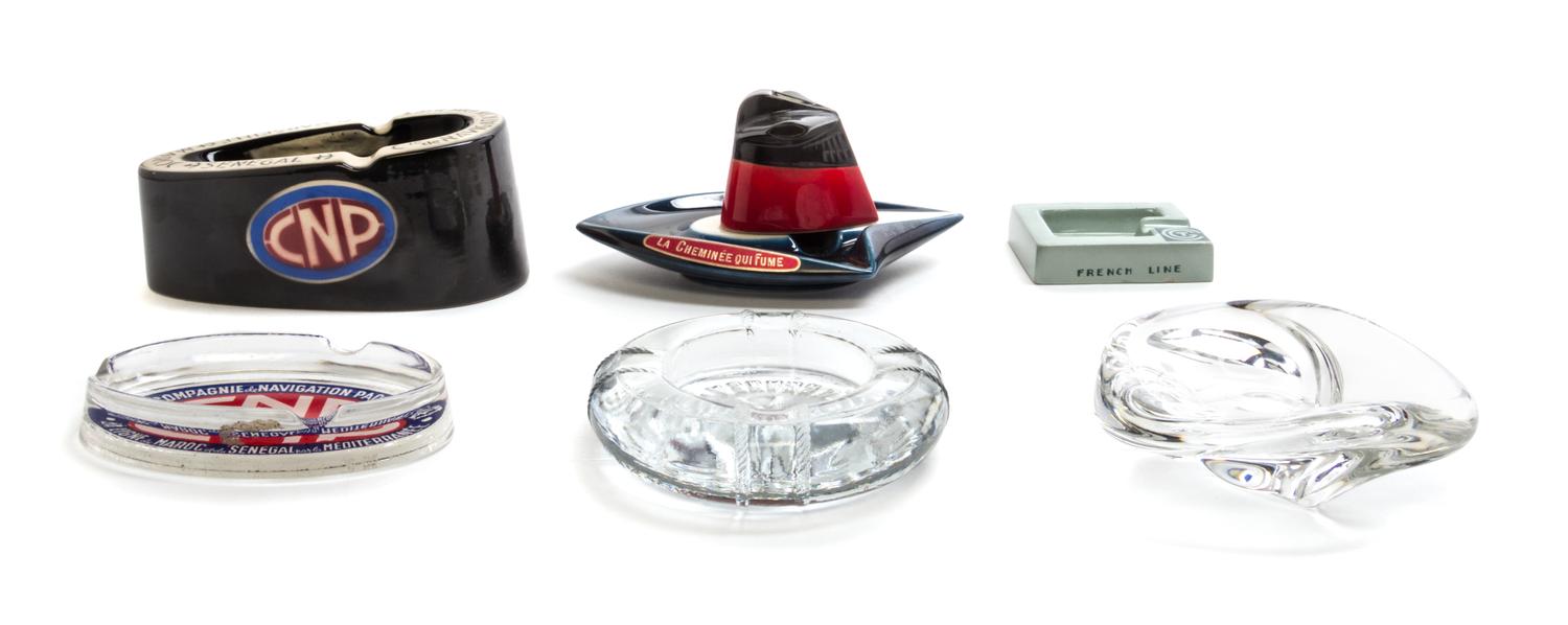 A Collection of Glass and Ceramic Ash Receivers from French Ocean Liners Height of tallest 2 1/4 inches. — 20TH CENTURY