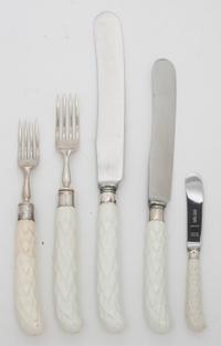An English Silver and Porcelain Flatware Service, C. W. Fletcher, 1937, with white porcelain handles, retailed by B. Altman & Co. in a