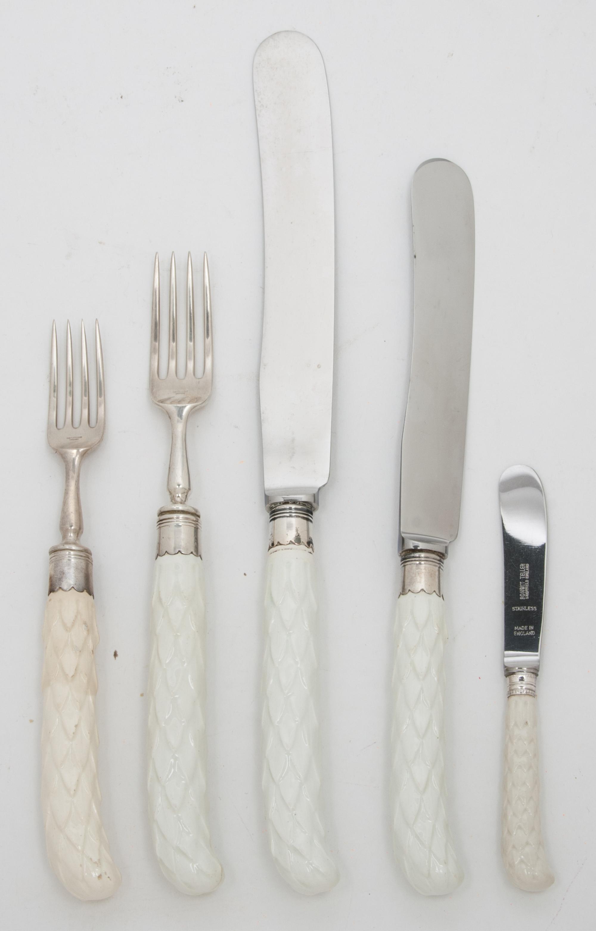 An English Silver and Porcelain Flatware Service, C. W. Fletcher, 1937, with white porcelain handles, retailed by B. Altman & Co. in a