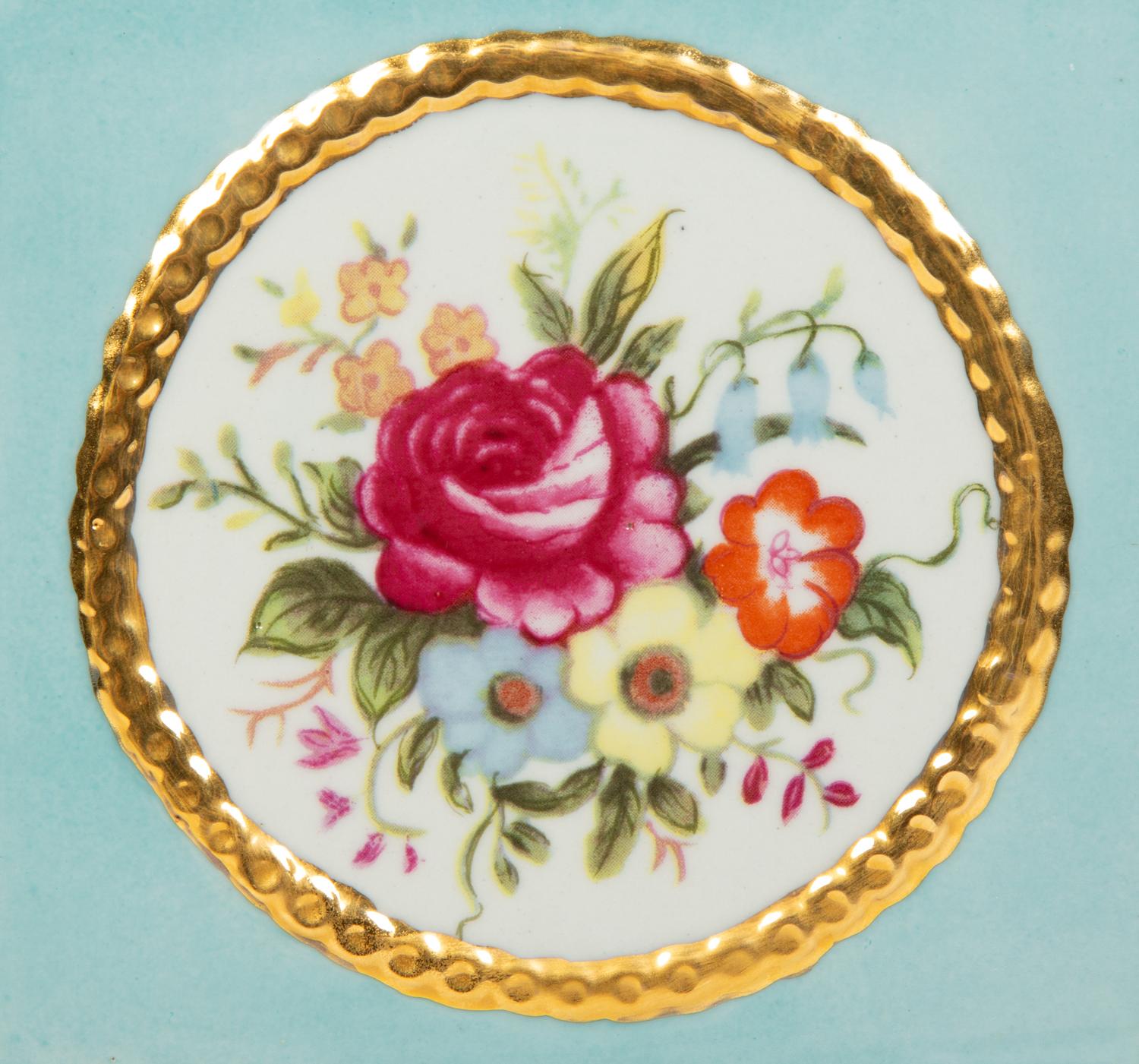 A Continental Porcelain Jardinière and Stand