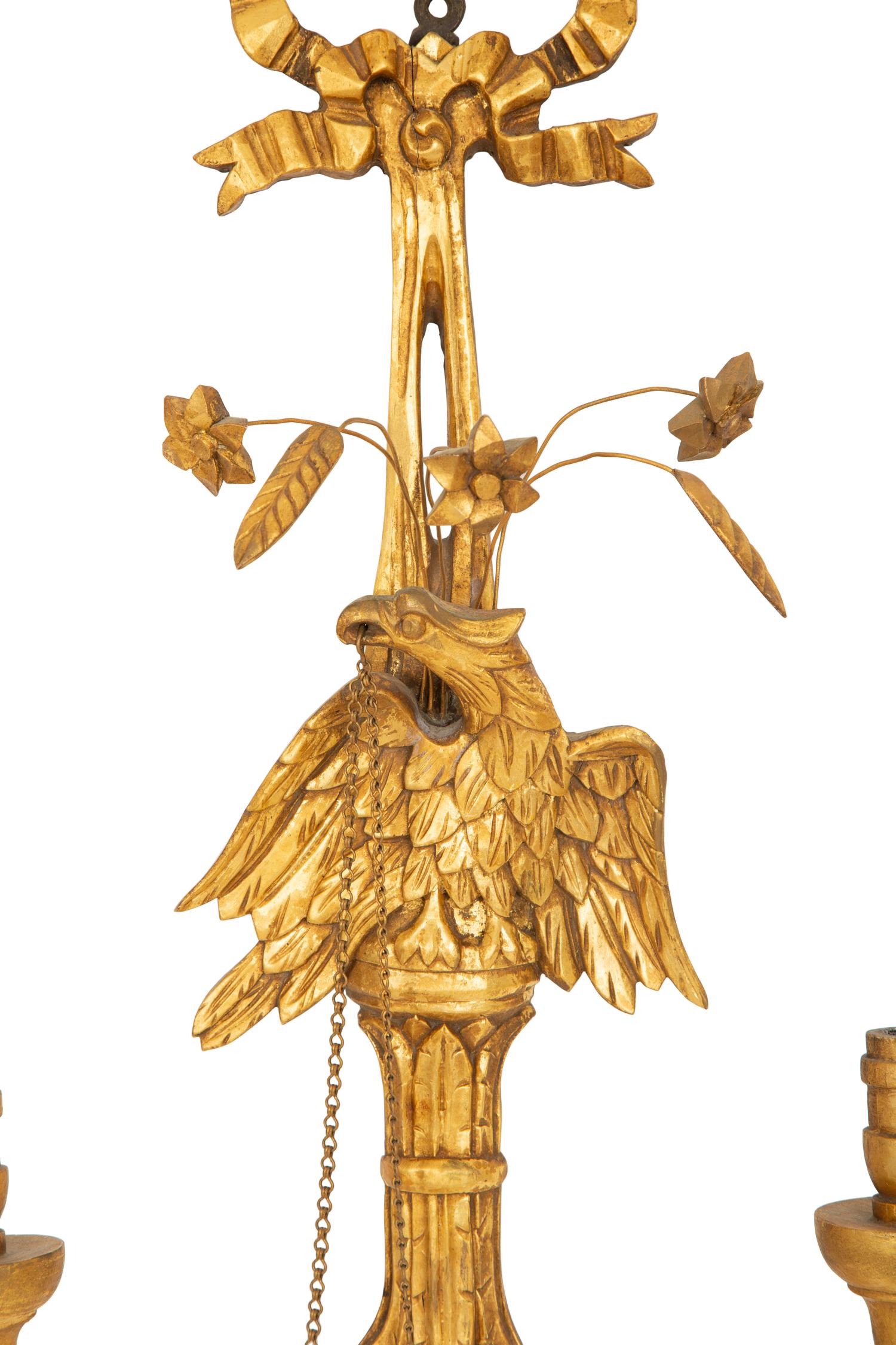 A Pair of Italian Gilt Wood Two Light Eagle Wall Sconces