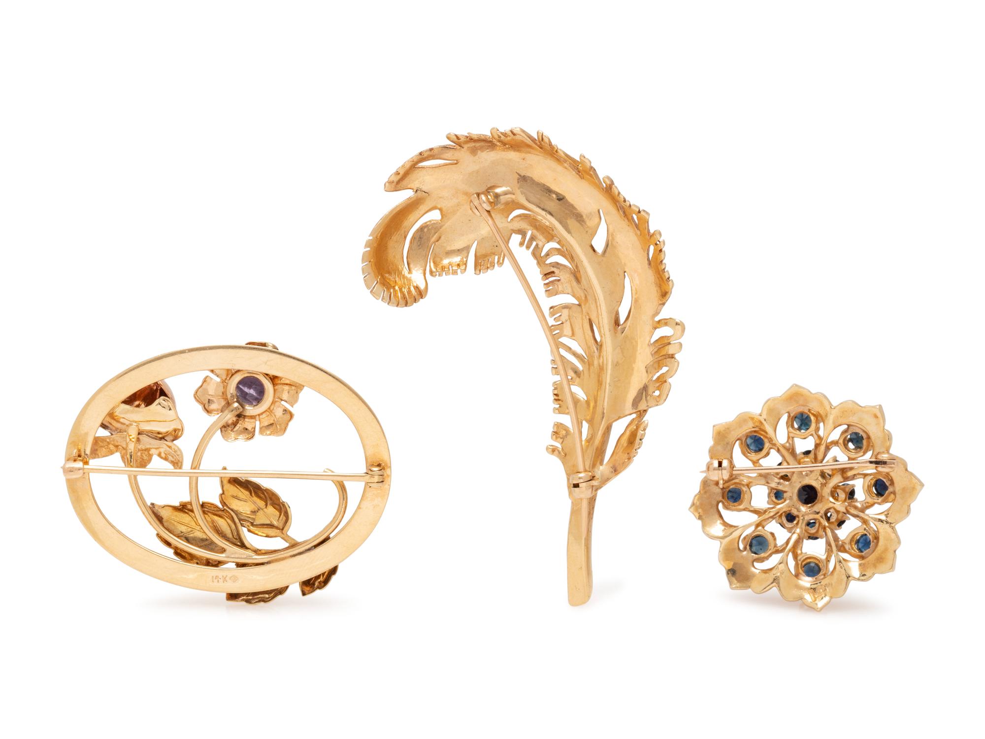 COLLECTION OF YELLOW GOLD BROOCHES