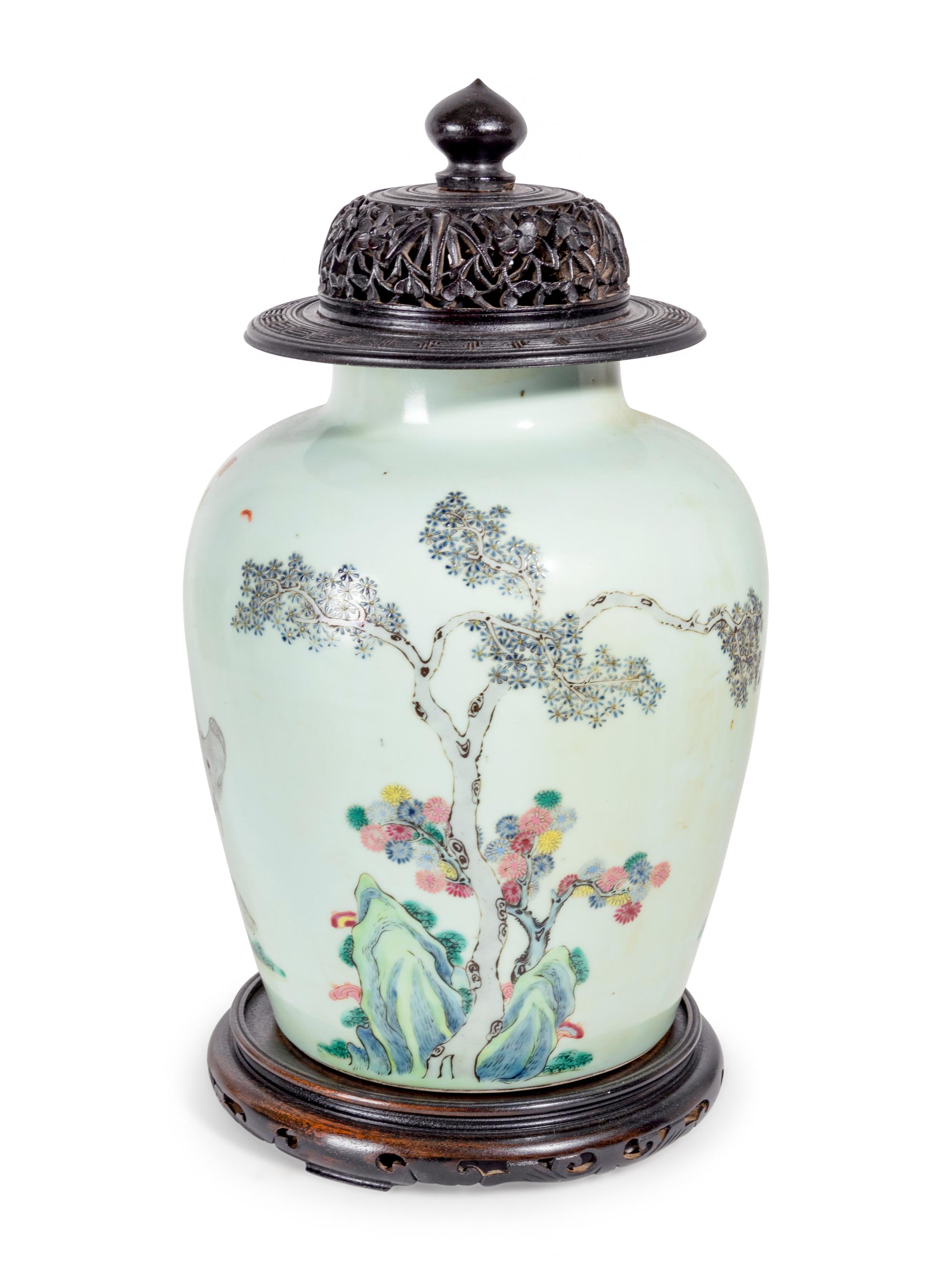 A Chinese Export Famille Rose Porcelain Jar and Carved Wood Cover