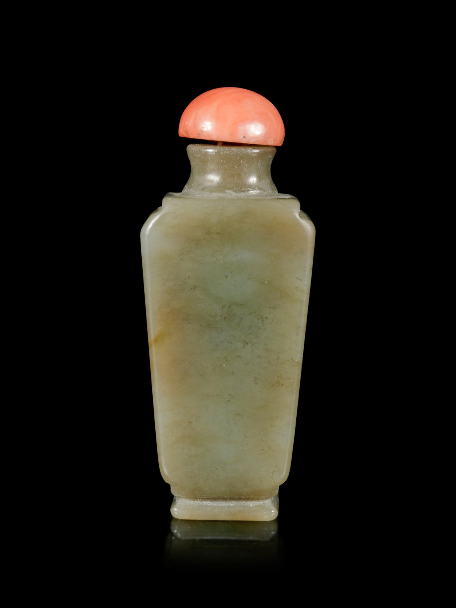 A Russet and Celadon Jade Snuff Bottle