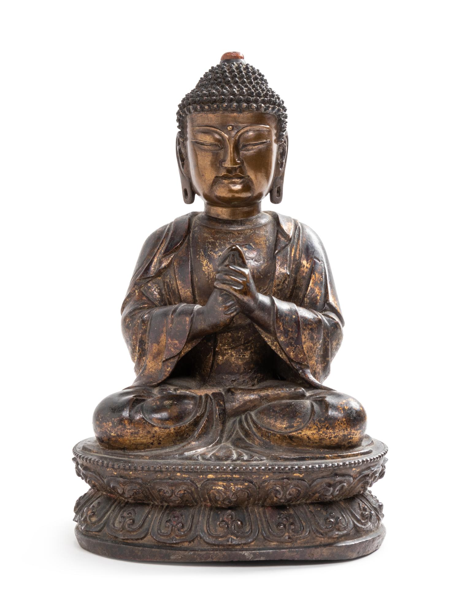 A Chinese Bronze Seated Buddha