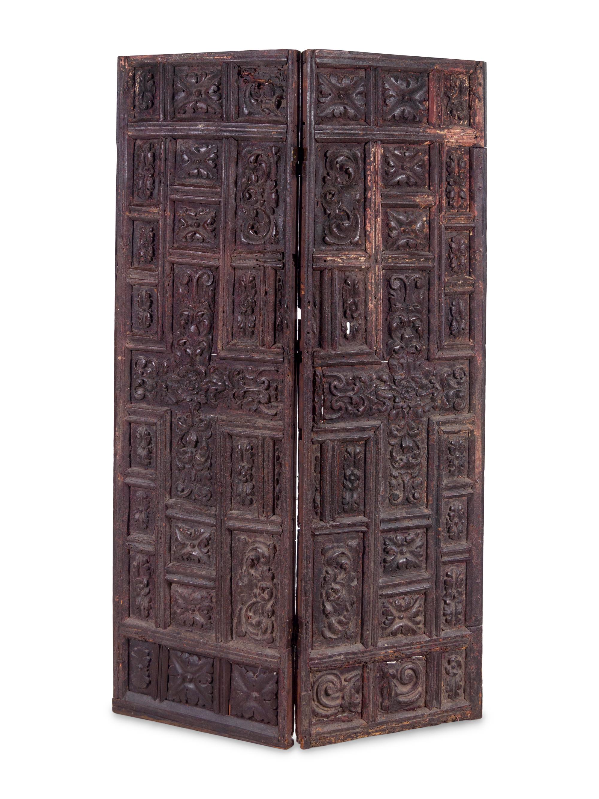 A Pair of Continental Carved Panels or Doors