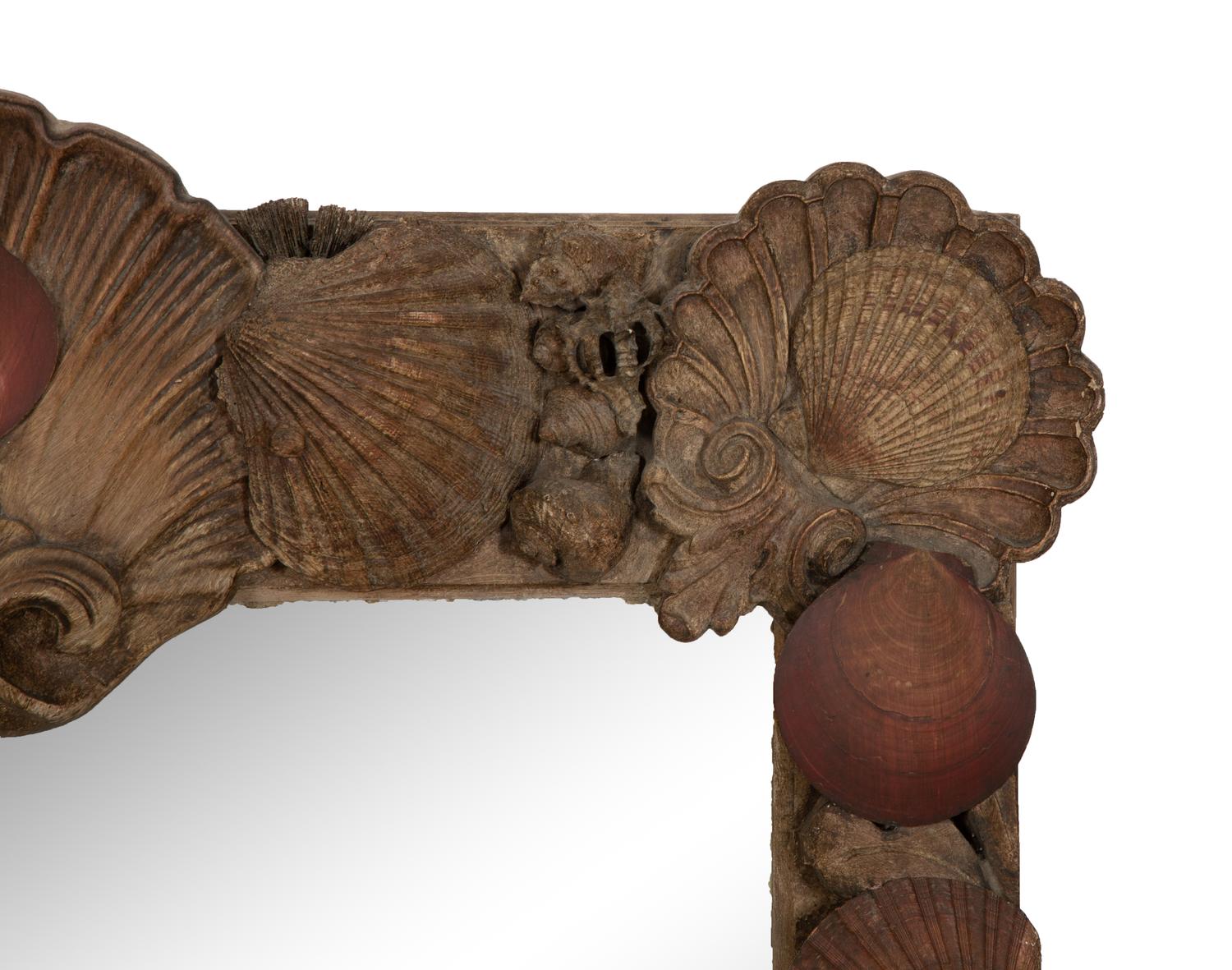 A Grotto Style Carved Giltwood Mirror