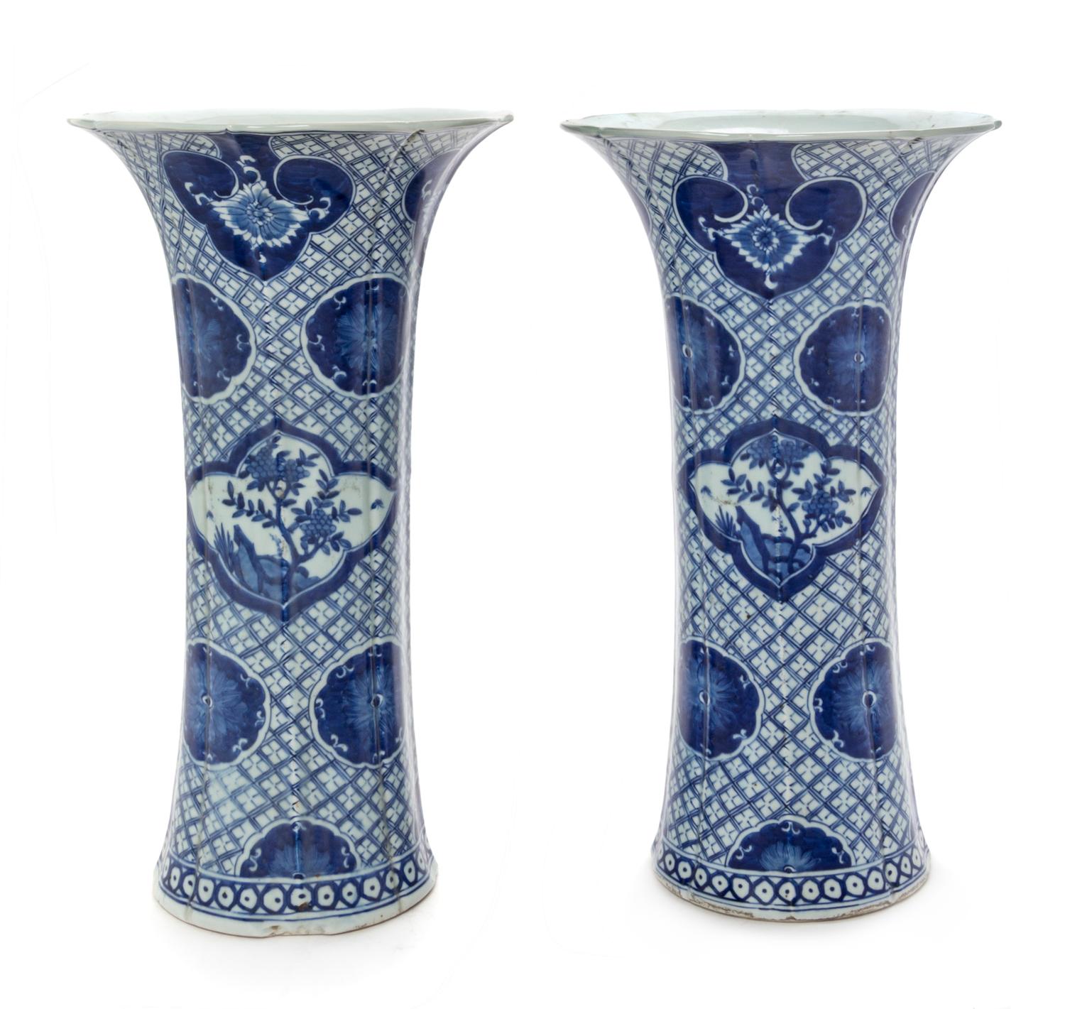 A Pair of Chinese Blue and White Porcelain Gu Vases Height of each 19 inches. — 19TH CENTURY