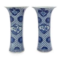 A Pair of Chinese Blue and White Porcelain Gu Vases Height of each 19 inches. — 19TH CENTURY