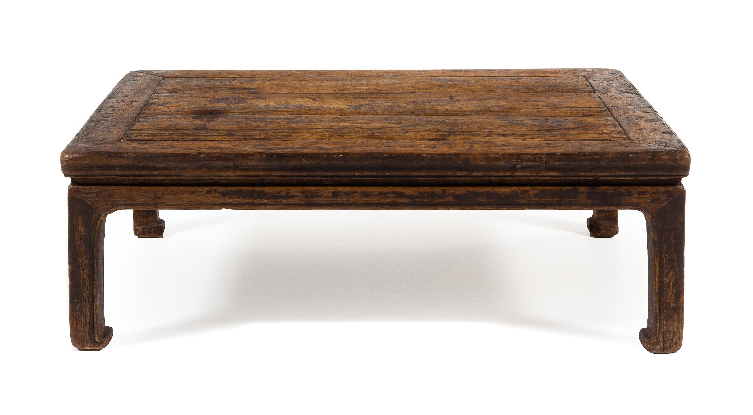 A Chinese Elmwood Kang Table, Kangzhuo Height 11 1/2 x width 35 x depth 25 inches. — 19TH CENTURY