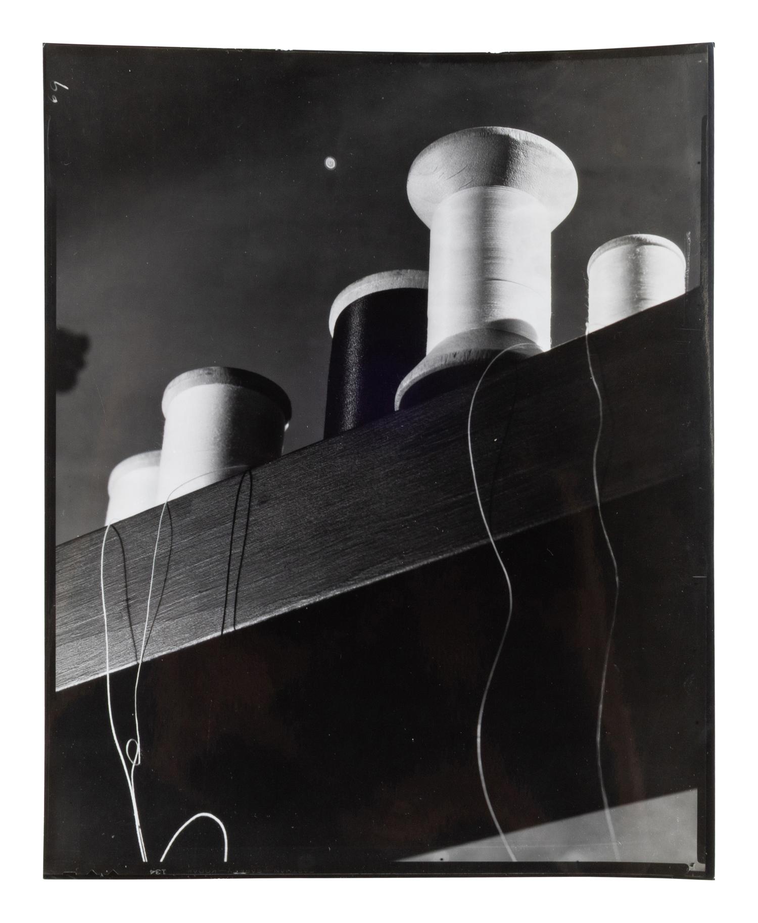 A group of five works ( Spools; Peter Lorre; #5; Model Standing in Rocks; Stairway Up Fuel Storage Tank )