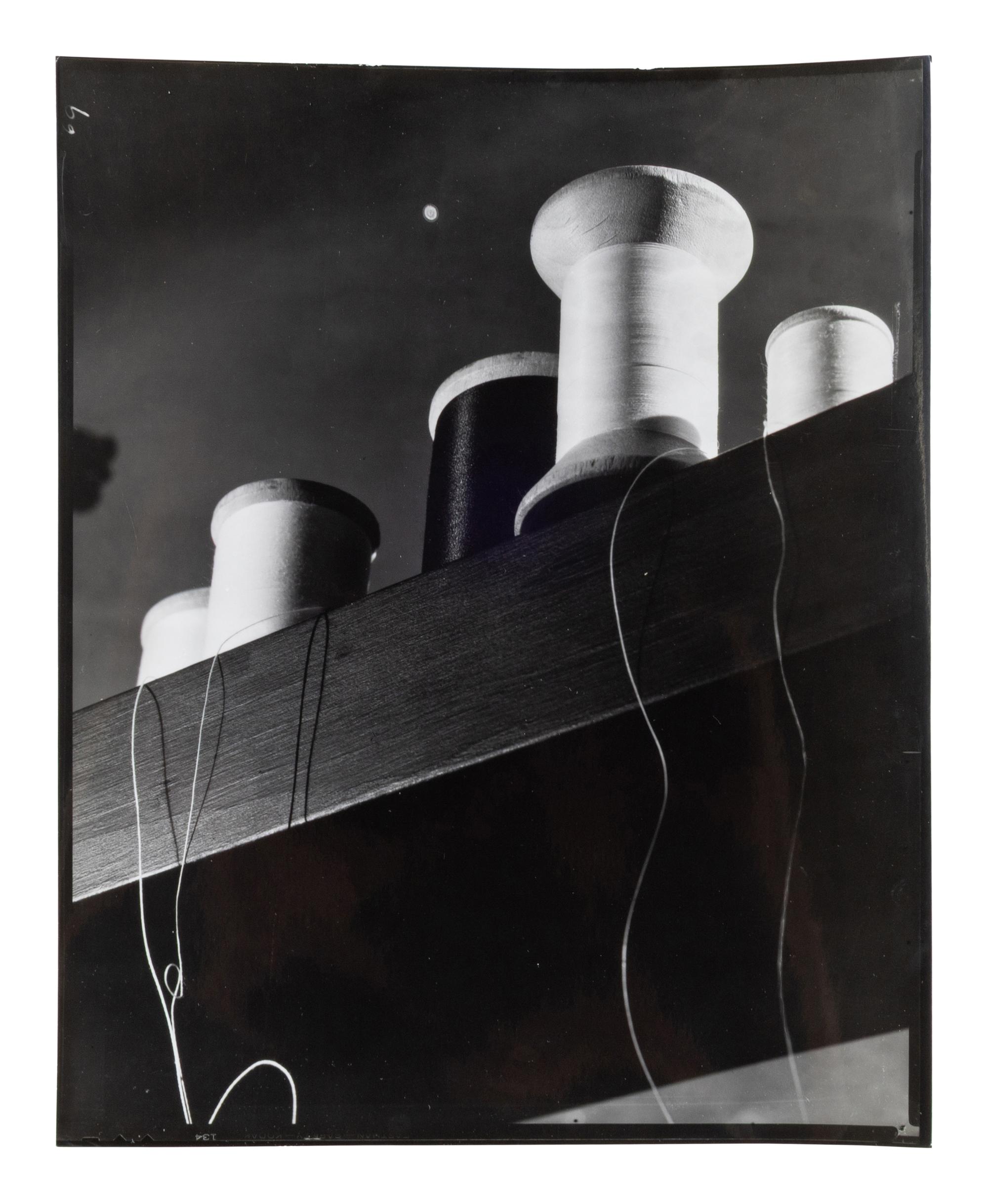 A group of five works ( Spools; Peter Lorre; #5; Model Standing in Rocks; Stairway Up Fuel Storage Tank )