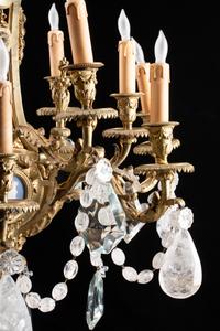 A Gilt-Bronze, Rock Crystal and Glass Twelve-Light Chandelier