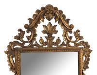 An Italian Baroque Style Giltwood Mirror