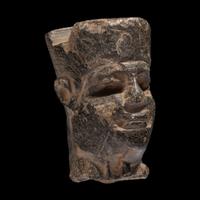 An Egyptian Stone Head of Amun