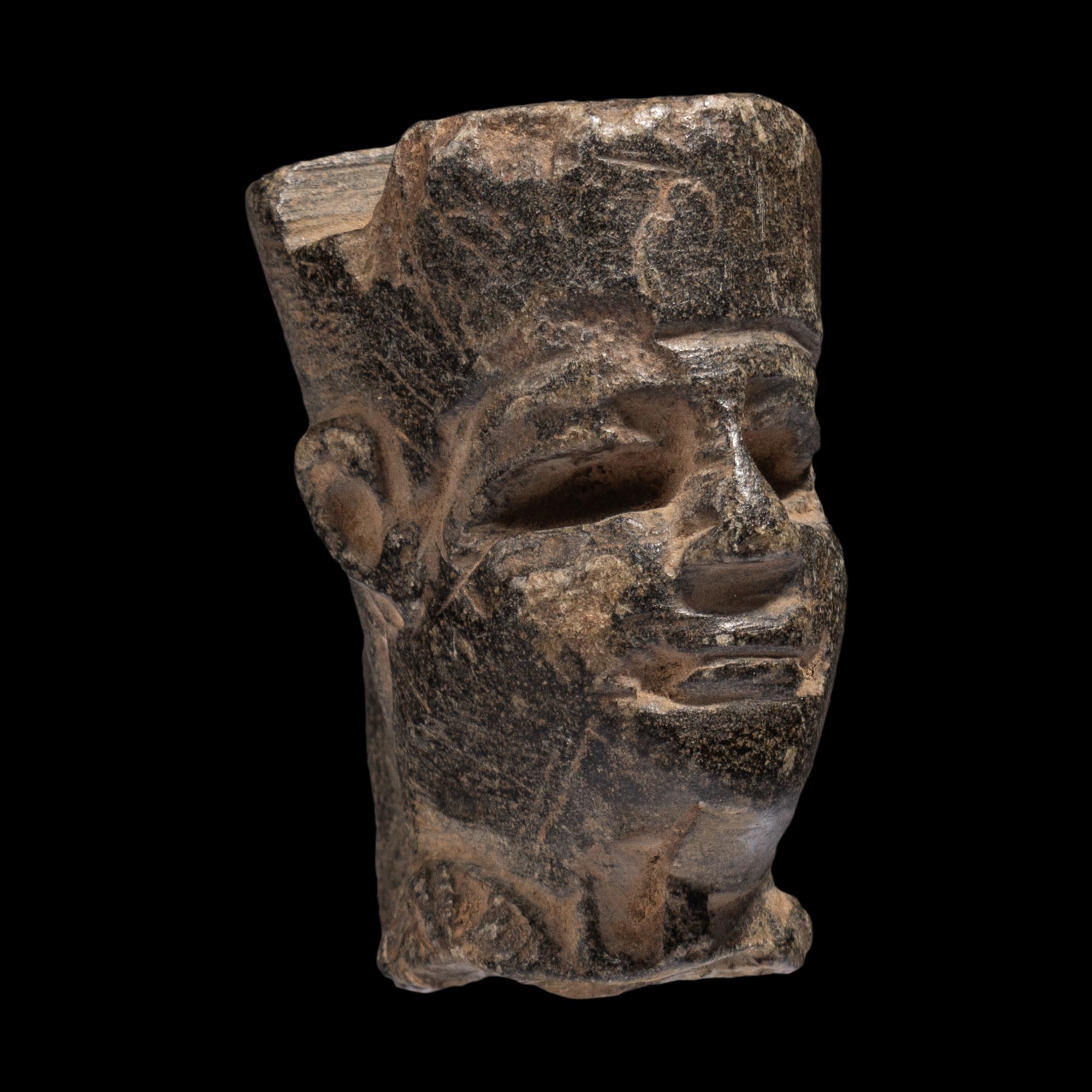 An Egyptian Stone Head of Amun