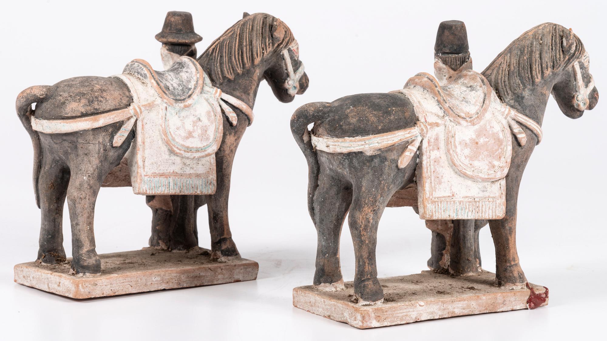A Pair of Chinese Terracotta Horses with Standing Attendants