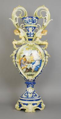 An Italian Majolica Handled Urn, Height 34 inches.