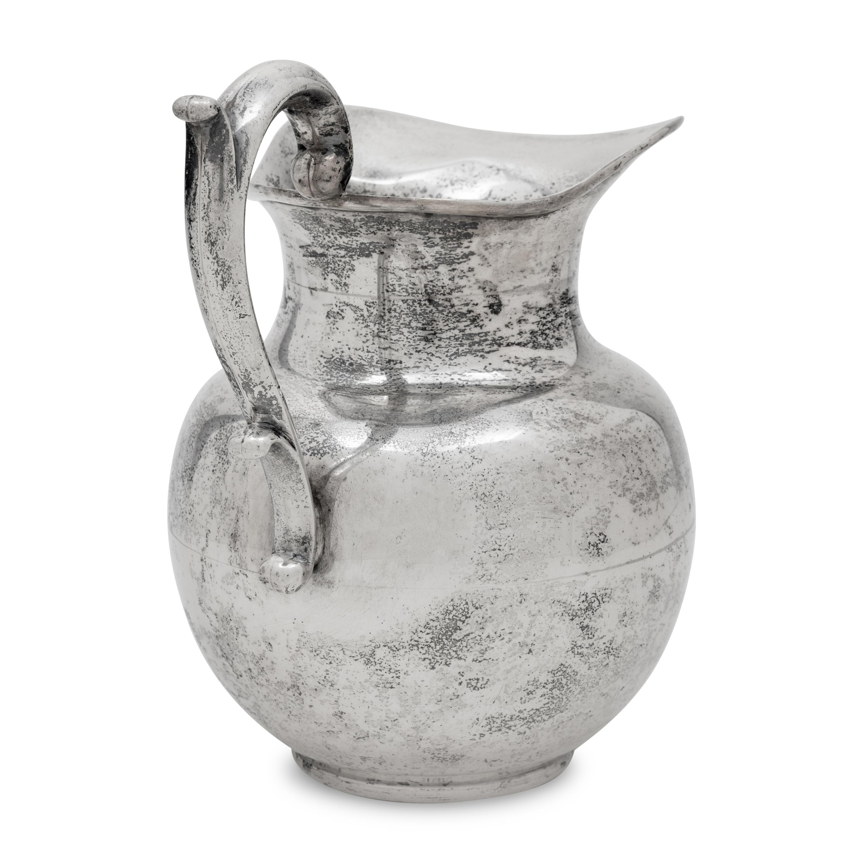 A Mexican Silver Water Pitcher