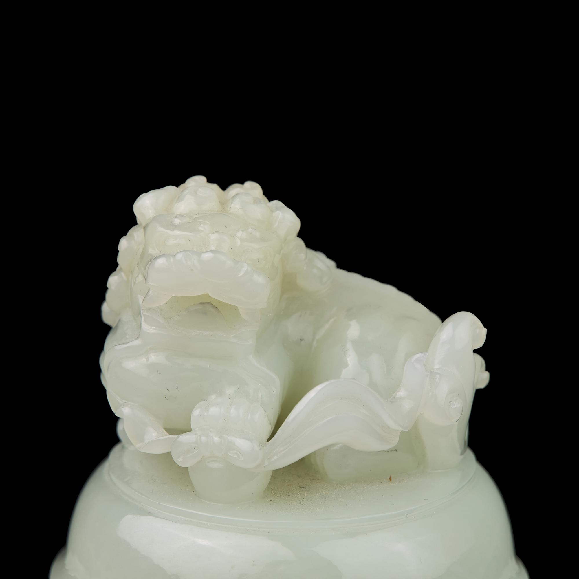 A Chinese White Jade Tripod Censer and Cover, 20th Century 近代 白玉活環耳三足爐