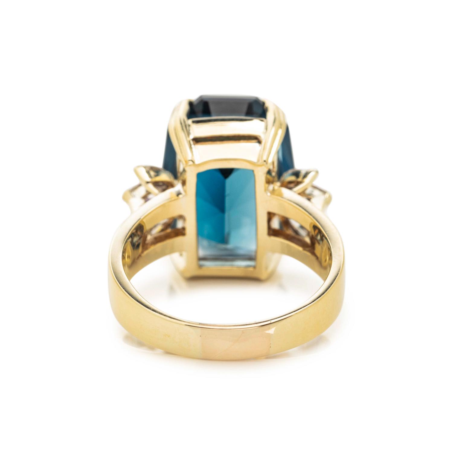 BLUE TOPAZ AND DIAMOND RING