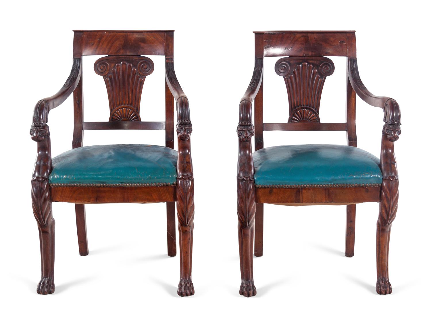 A Pair of Baltic Neoclassical Carved Mahogany Armchairs