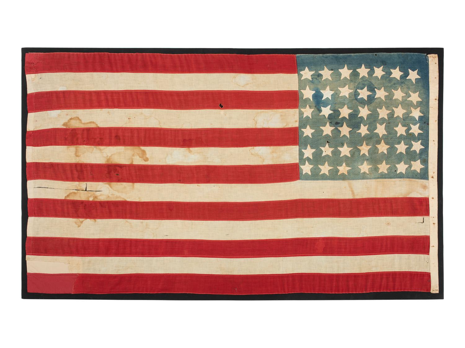 [FLAGS]. 42-star American flag with blue calico canton. Ca 1889-1890.
