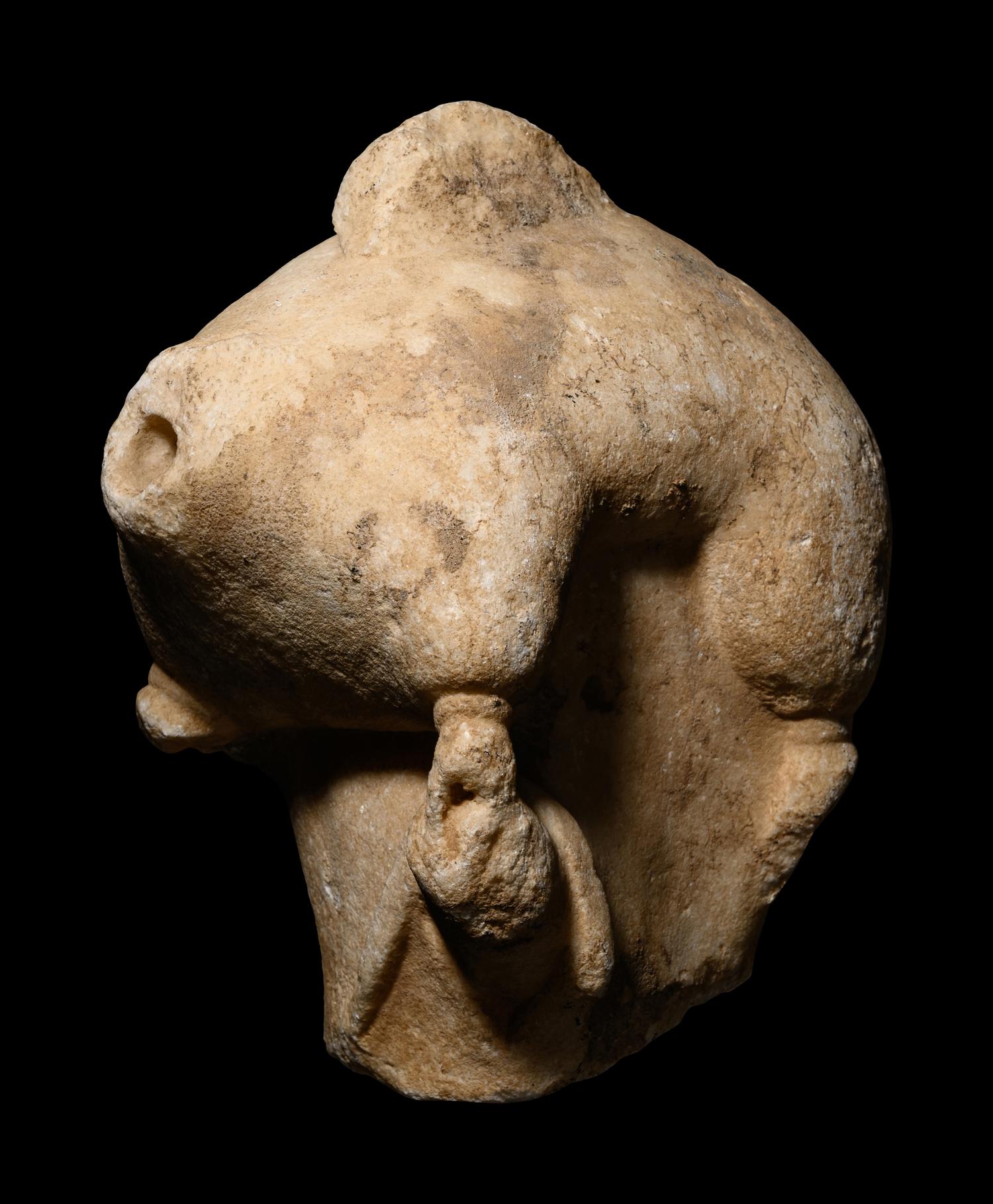 A Roman Marble Wineskin Fragment