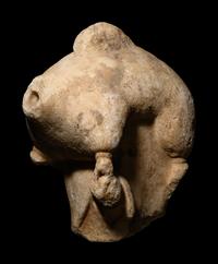 A Roman Marble Wineskin Fragment