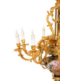 A Pair of Sèvres Style Porcelain and Gilt Bronze Nine-Light Chandeliers