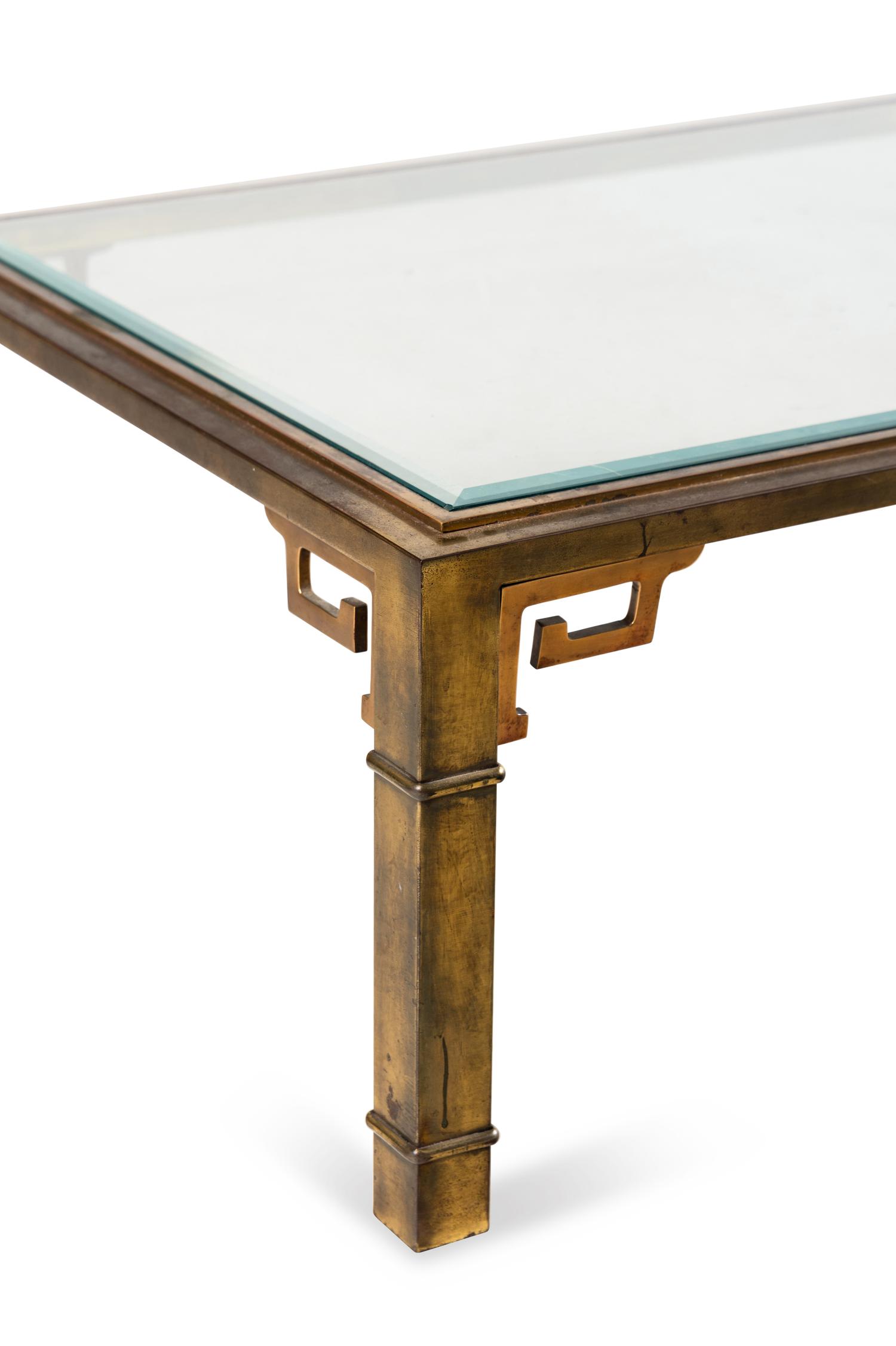 A Brass and Glass Cocktail Table
