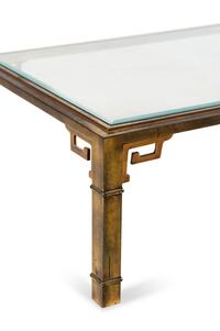 A Brass and Glass Cocktail Table