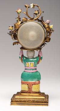A French Gilt Bronze and Porcelain Mantel Clock
