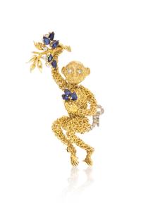 An 18 Karat Yellow Gold, Sapphire and Diamond Brooch in a Monkey Motif, 23.00 dwts.
