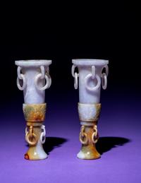 A Pair of Chinese Lavender and Russet Jadeite Gu Vases