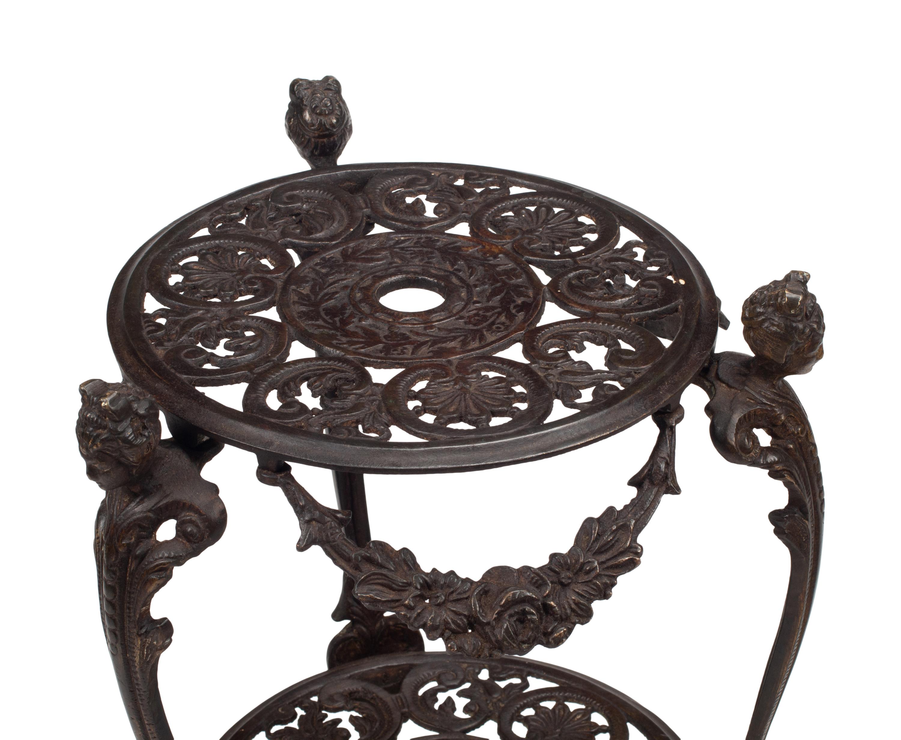 A Pair of Louis XV Style Bronze Three-Tier Figural Stands