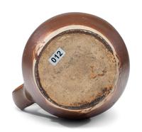 A P.H. Smith Albany Slip Stoneware Pitcher