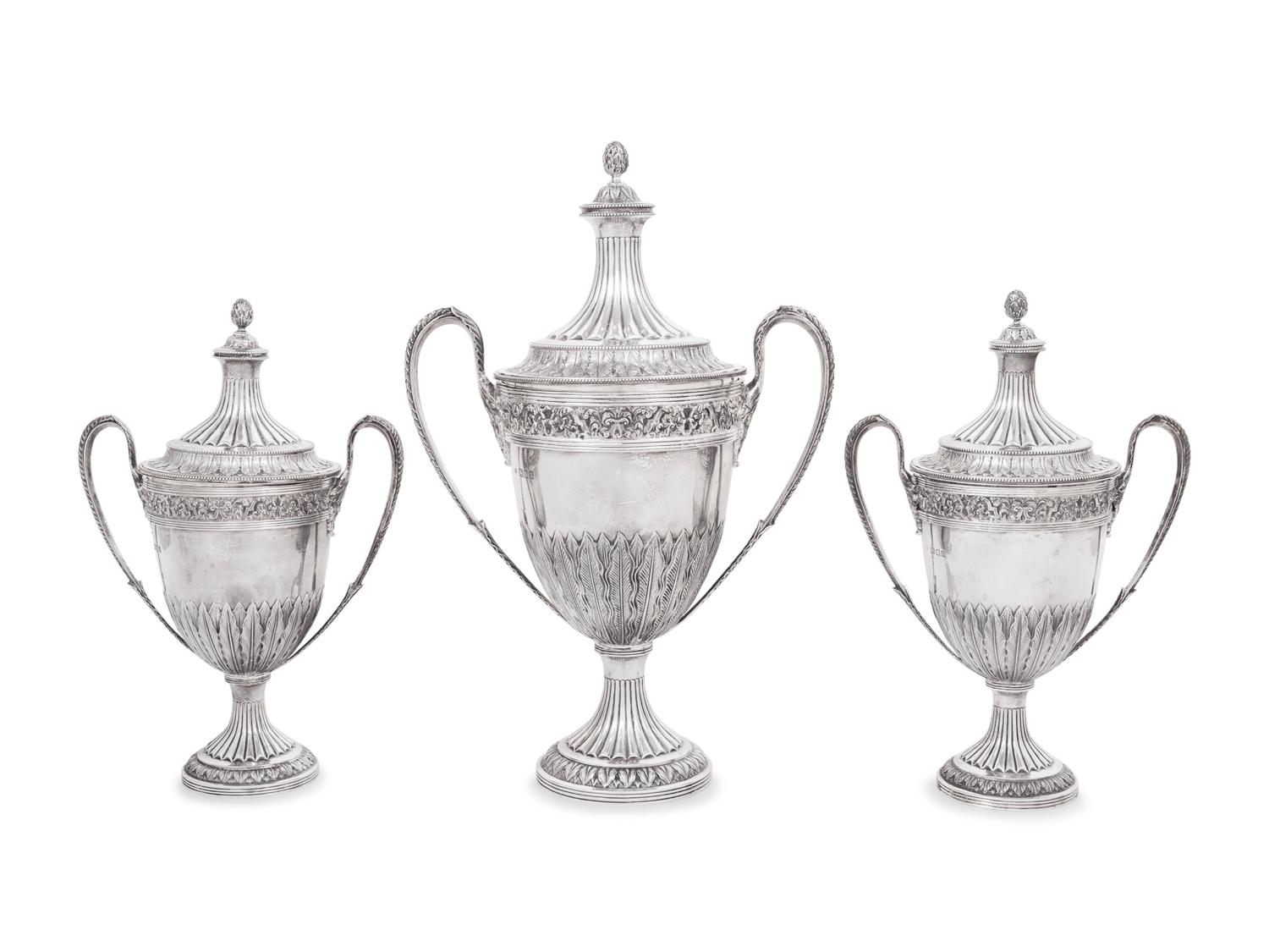 A Set of Three English Silver Covered Urns