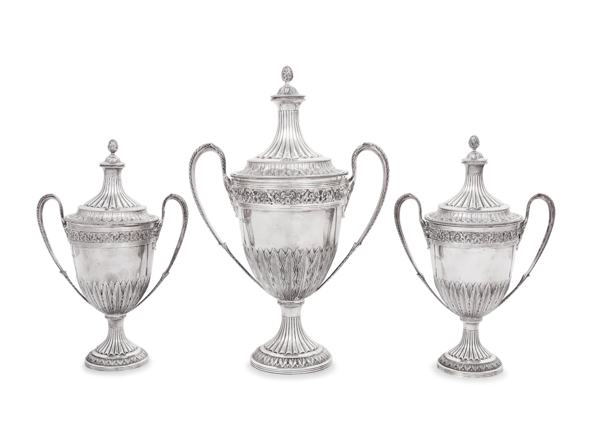 A Set of Three English Silver Covered Urns