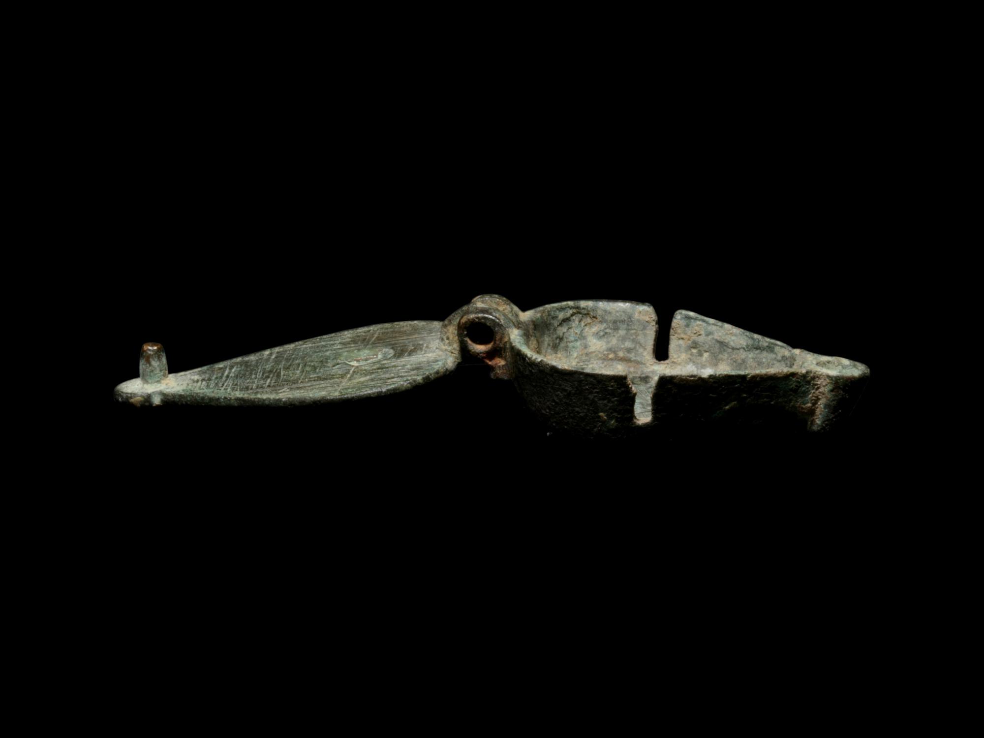 A Late Roman Bronze and Enamel Pendant with Phallic Symbols