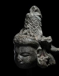An Indian Carved Black Stone Head of a Vishnu