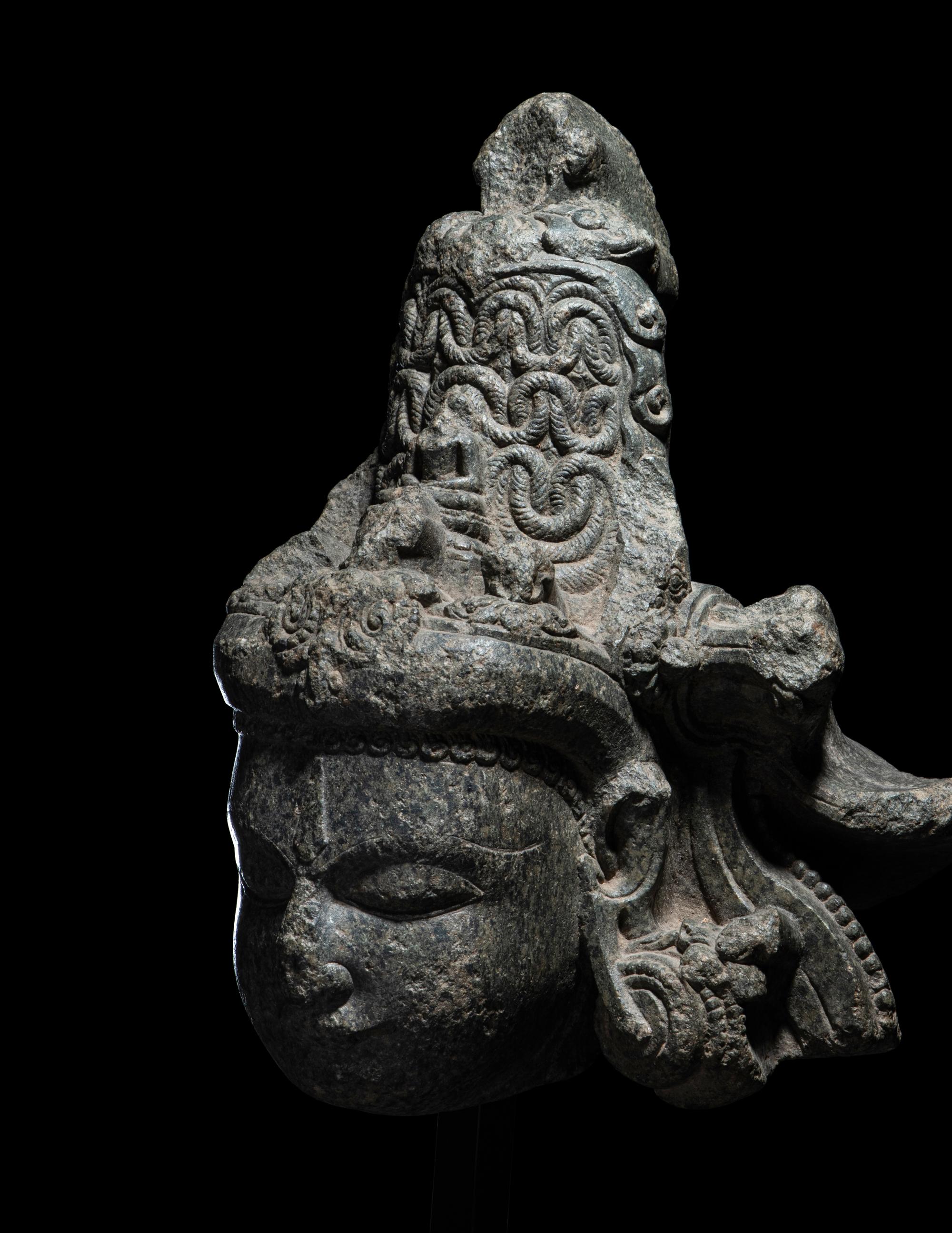 An Indian Carved Black Stone Head of a Vishnu