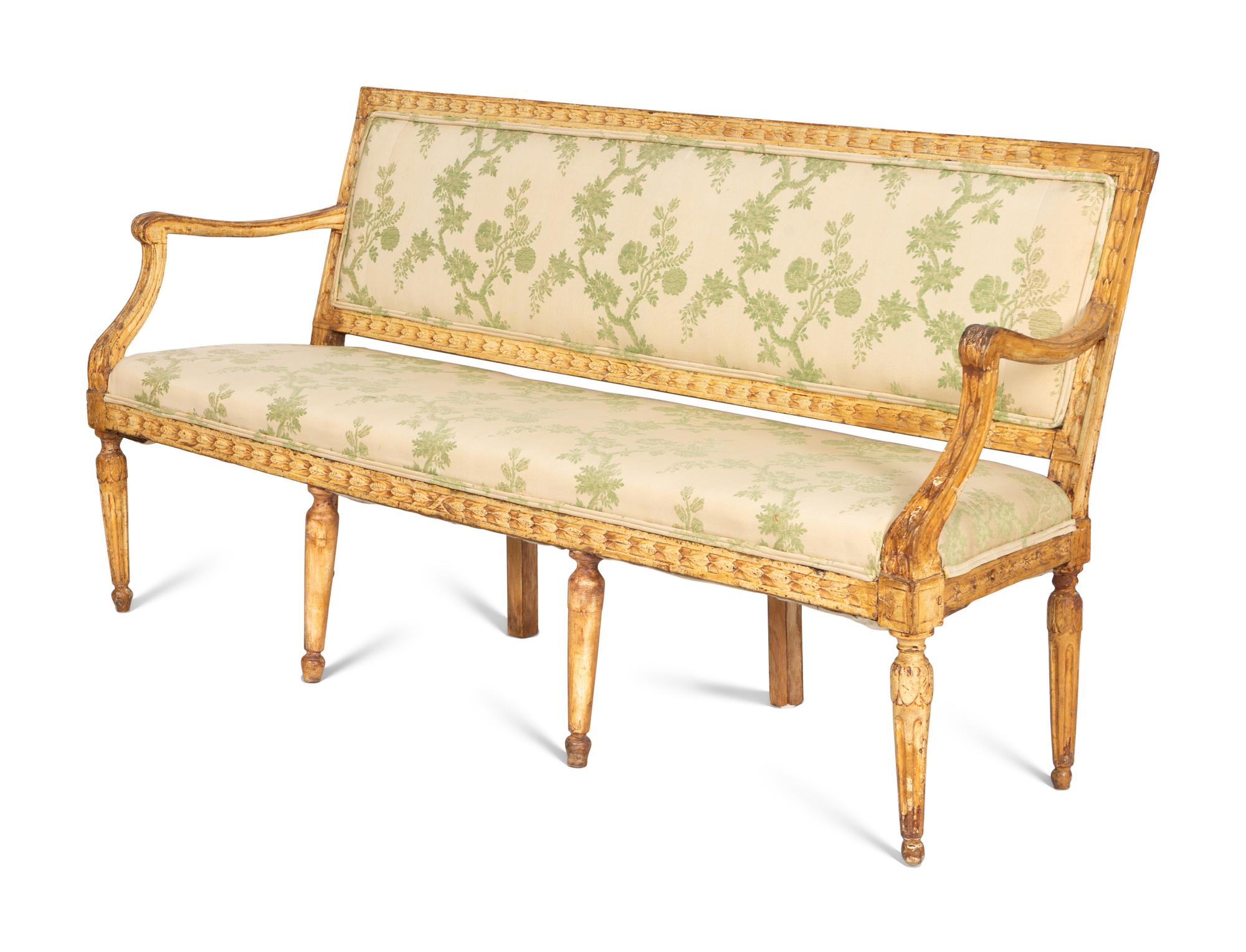 A Near Pair of Italian Neoclassical Cream-Painted Sofas