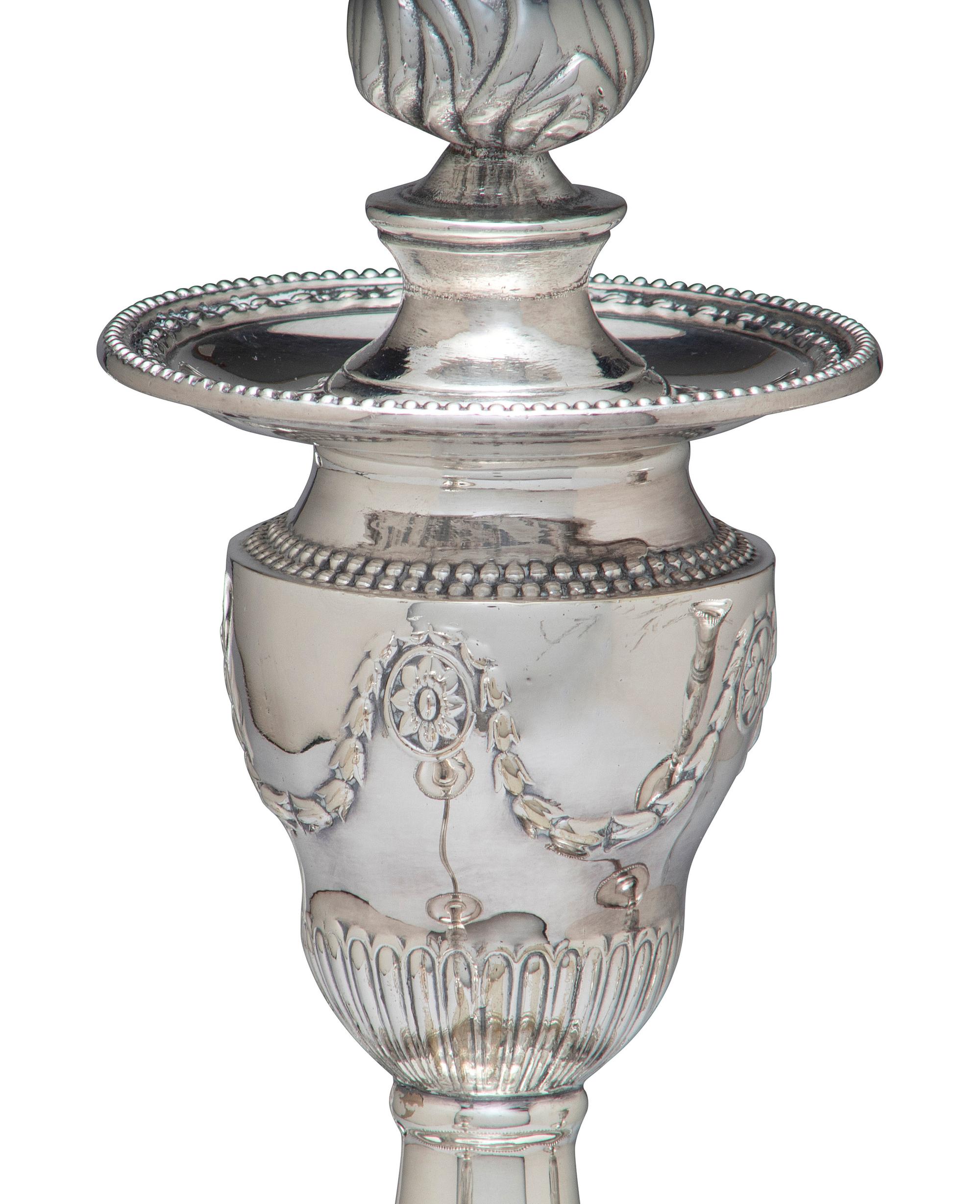 A Pair of Neoclassical Silver-Plate Four-Light Convertible Candelabra